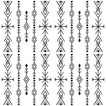 Linear geometric boho seamless pattern. Vertical black tribal lines on white background.