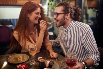 Happy couple on a dinner together