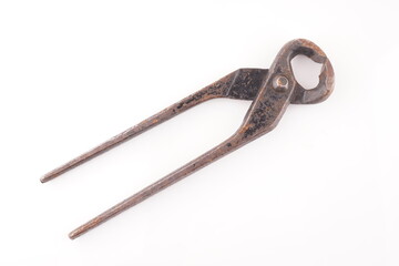 rusty pliers on white background
