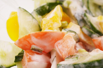 cucumber salad with tomato and sour cream