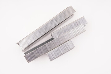 staples for construction stapler on white background
