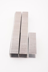 staples for construction stapler on white background