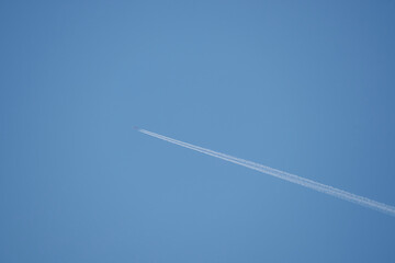 airplane in the sky with clouds