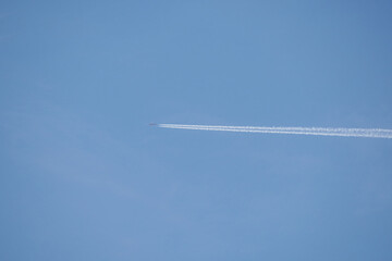 airplane in the sky with clouds