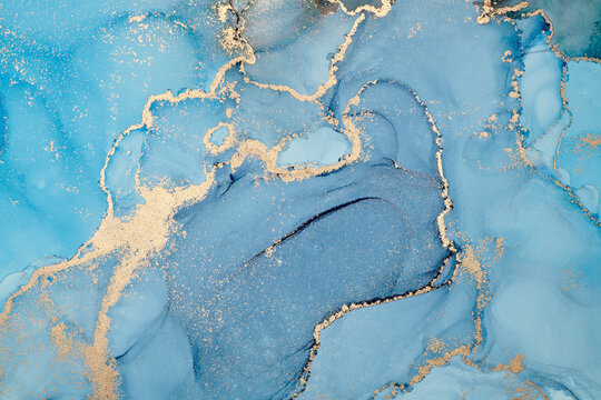 Natural luxury abstract fluid art painting in alcohol ink technique. Tender and dreamy wallpaper. Mixture of colors creating transparent waves and golden swirls. For posters, other printed materials © Djero Adlibeshe