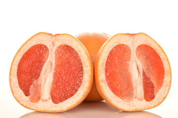 organic ripe grapefruits, close-up, isolated on white.