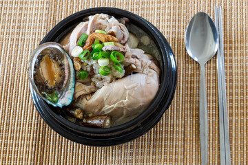 Ginseng chicken soup with abalone which is called Jeonbok Samgyetang
