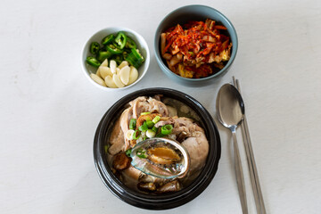 Ginseng chicken soup with abalone which is called Jeonbok Samgyetang