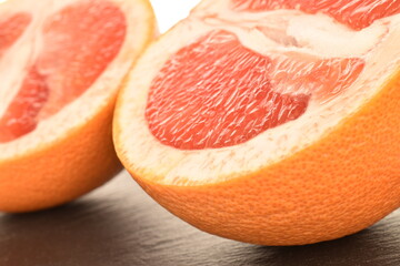 organic ripe grapefruits, close-up, isolated on white.