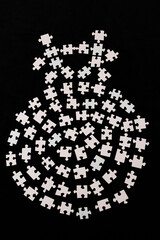 puzzle figures on a black background