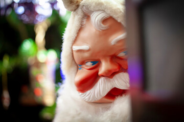 Creepy Santa is watching you - vintage Santa Claus decor for Christmas concept of Naughty and Nice