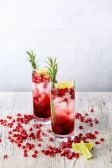 Pomegranate Gimlet - a gin based cocktail with lime juice, gin can be replaced with vodka.