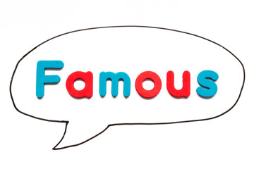 Alphabet letter with word famous in black line hand drawing as bubble speech on white board background