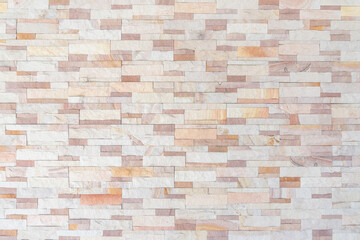 Sandstone wall background of white golden sand stone jigsaw tile, rock brick modern texture pattern for backdrop decoration