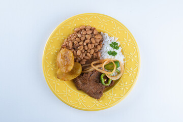 Brazilian lunch food dish with white background.