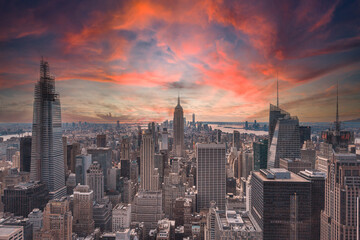 New York, United States "; January 5, 2020: Sunset in Top of the Rock in New York, beautiful view of the Empire State and its surroundings.