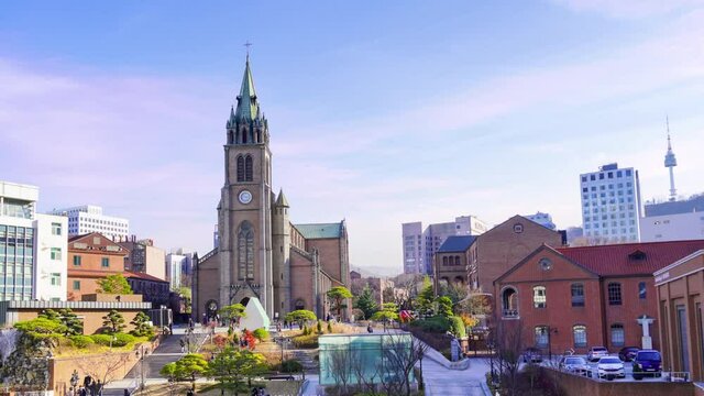 People climb the stairs of Myeongdong Cathedral in the daytime. Seoul City Center, South Korea