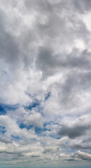 Fantastic clouds against blue sky, panorama