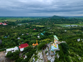 Fototapeta Lopburi, Thailand - October 9,2020 : Wat Khao Samo Khon, Photograph of cityscape view of the old town. Famous historic for tourist travel in Lopburi.. obraz