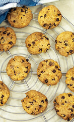 Chocolate Chip Cookies on grid with napkin on marble background