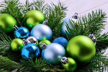 Fototapeta na wymiar Christmas background with blue and green balls