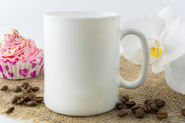 Placeit-Coffee mug mockup with muffin and orhid