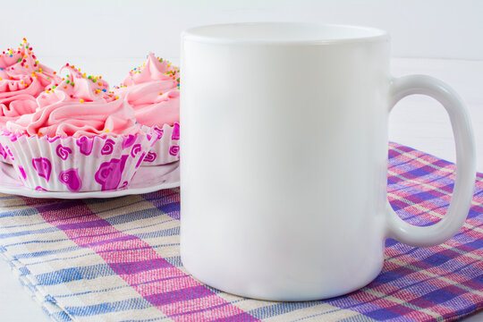 Coffee mug mockup with cupcakes