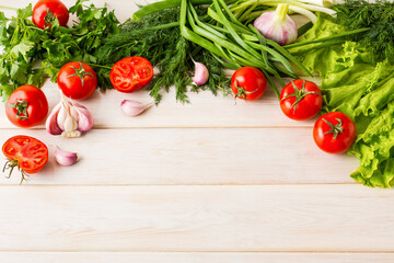 Fresh vegetables on the wooden background copy space
