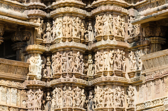 Sculptures carved on the facade of Khajuraho Hindu temples, India	

