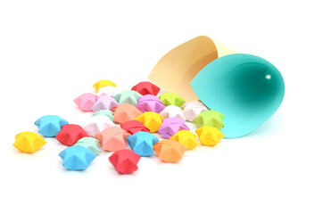 two colorful paper cone spill out lucky paper stars