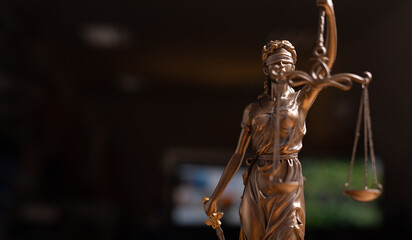Statue of lady justice on bright background - Side view with copy space..