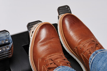 Press break and throttle pedals