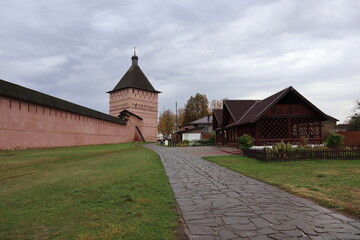 View of the old red brick fortress with towers 