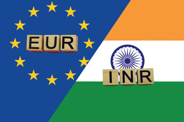 United Europe and India currencies codes on national flags background