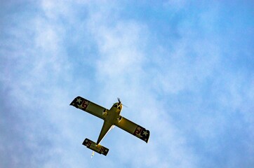 Aerobatic plane flying high in the sky