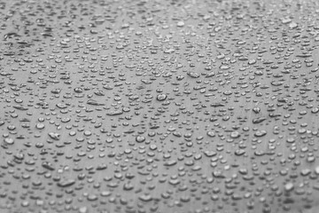 Water drops on smooth surface of waterproof fabric