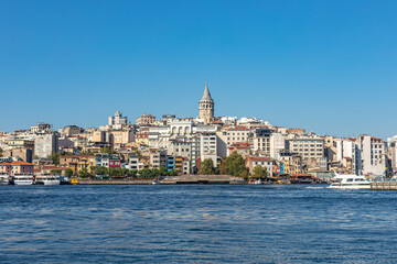 Fototapeta na wymiar Istanbul, Turkey - September 2020: Panorama with Galata Tower, built in the 14th century by the Genoese colony as part of the defense wall, now touristic attraction and city landmark