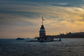 Fototapeta premium Istanbul, Turkey - September 2020:Maiden's Tower or Kiz Kulesi located in the middle of Bosporus in the beautiful twilight