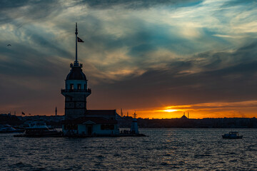 Istanbul, Turkey - September 2020:Maiden's Tower or Kiz Kulesi located in the middle of Bosporus in the beautiful twilight