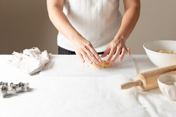 hands kneading dough