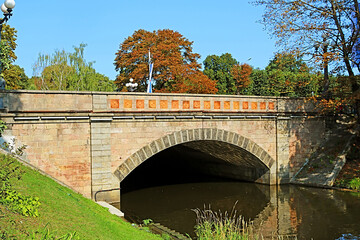 Bridge over channel in the city park in downtown, Riga, Latvia