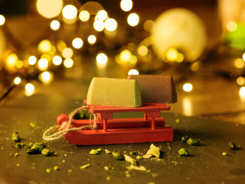 Pistachio candies  on the background of the Christmas tree