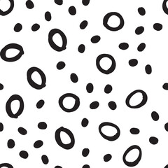 Doodle dots seamless pattern. Hand drawn circles background. Monochrome texture.