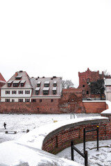 Old Town Hall, Torun. Winter in the city. Snowy day and old buildings of the city of Torun. Poland 