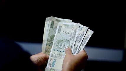 India women counting Indian currency