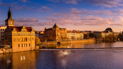 Fototapeta na wymiar View on the Vltava river in the dramatic evening.
