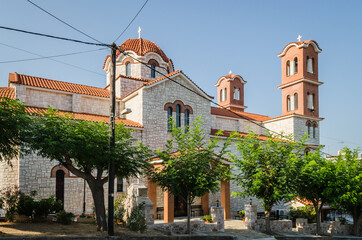 Fototapeta na wymiar Evia island, Greece - July 01. 2020: Agios Panteleimonas Orthodox Church in Edipsos