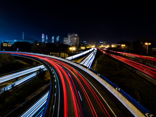 Fototapeta na wymiar Night landscape of car lights that intersect with long exposure