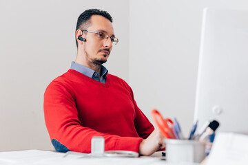 Attractive businessman working in office