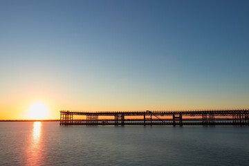Fototapeta na wymiar Mining pier known as the Tinto Dock at sunset 